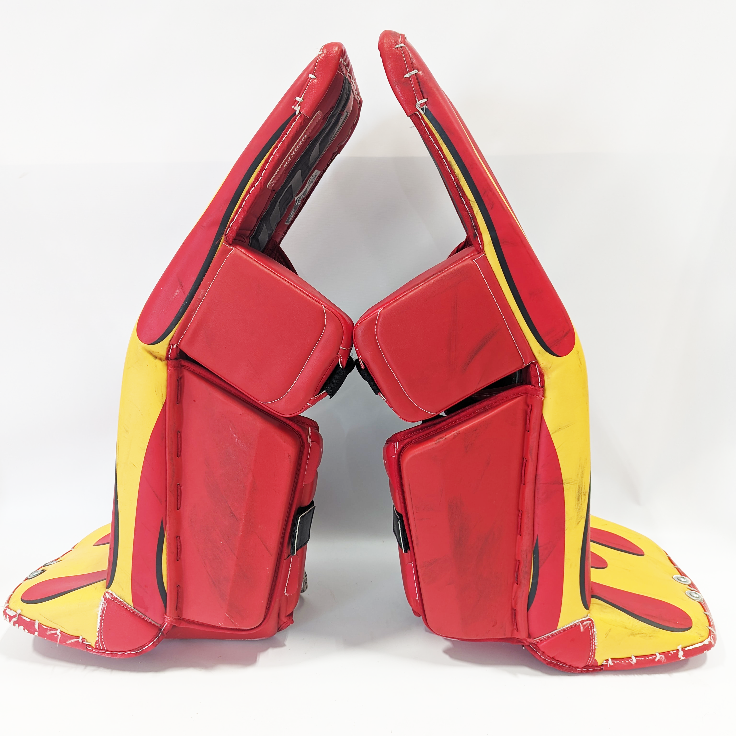 Bauer Supreme Ultrasonic- Used AHL Pro Stock Goalie Pads (Red/Yellow Flames)